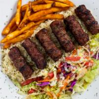 Turkish Meatballs · Turkish beef meatballs with seasoning served with French fries and salad.