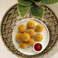 Mac & Cheese Balls · (Vegetarian) Bite-size clumps of mac and cheese breaded and fried until golden brown.