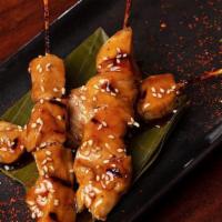 Chicken Swekers · Three skewers of chicken cooked in sake teriyaki sauce; topped with sesame seeds and togaras...