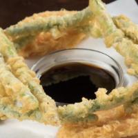 Vegetable Tempura · Lightly battered asparagus, shiitake, zucchini, bell peppers and onion rings, served with di...