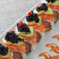 *Hell'S Kitchen · Crunchy salmon, cucumber, lemon-chili mayo, topped with salmon, avocado, tobiko caviar and S...