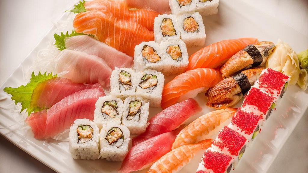 Sushi & Sashimi For Two†  · 4 tuna, 4 salmon, 2 shrimp, 2 yellowtail,. 2 eel, 2 albacore tuna, 1 each Eel Cucumber, Tuna Avocado Caviar, Crunchy Spicy Salmon Rolls