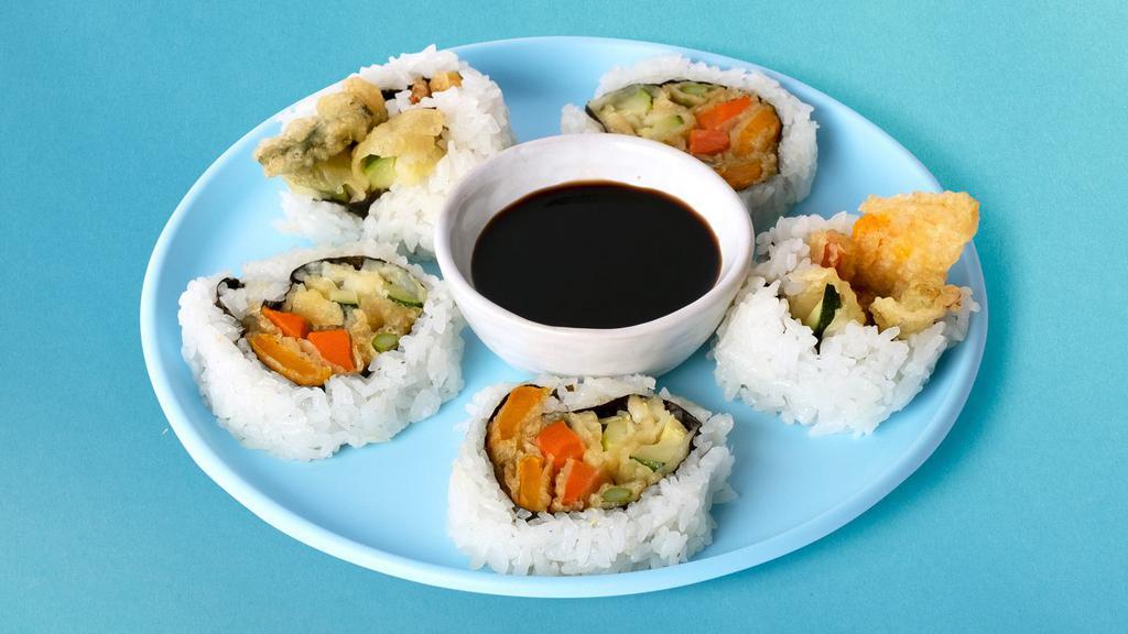 Vegetable Tempura Roll · Deep fried mixed vegetable tempura with rice wrapped in nori and topped with eel sauce.