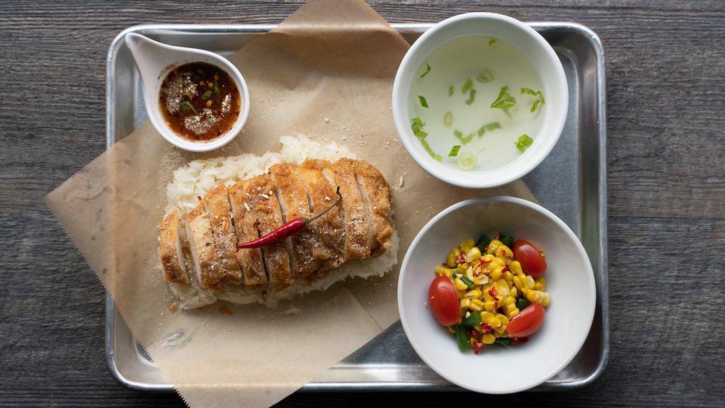 Zab Fried Chicken And Sticky Rice · Fried chicken with thai's favorite zab seasoning (spicy, citrusy, salty with a hint of sweetness) , sticky rice, tangy tamarind sauce, thai corn salad.