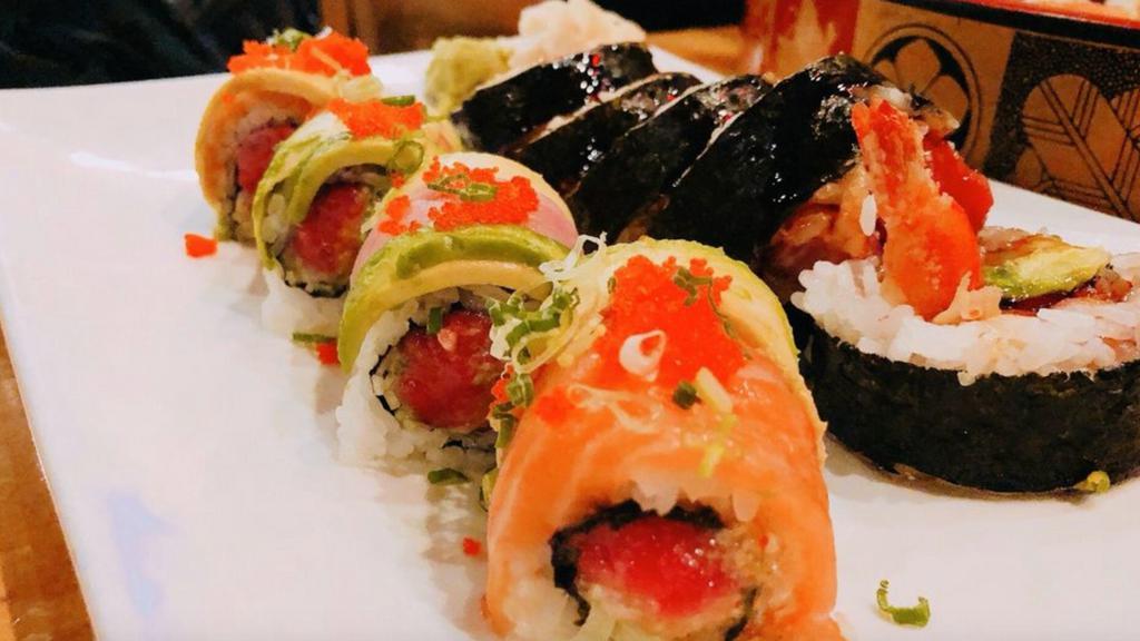 Rainbow Bright Roll · Spicy toro topped with avocado, salmon, yellowtail and tobiko.