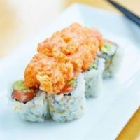 Crazy Roll · Your choice of fish, tobiko, avocado, topped with diced fish, tempura flakes, scallions and ...