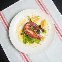 Grilled Octopus · Grilled mediterranean octopus with herbs and spices.