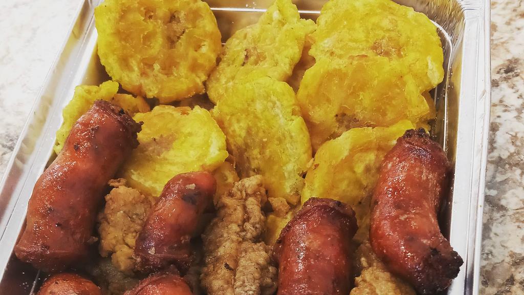 Chuleta Y Longaniza Frita Con Tostones · Pork chops and Dominican sausage (LONGANIZA)served with  FRIED PLANTAIN,  TOSTONES.