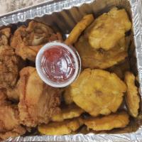 Fried Pork Chunks · Served with fried plantains or french fries.