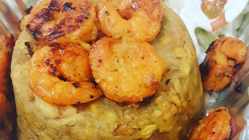 Shrimp Mofongo/Camaronmofongo · Fried plantains WITH garlic and WASAKAKA WITH shrimp and side SALAD.