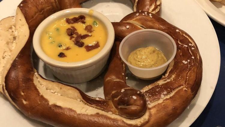Big Daddy Pretzel · With bacon cheese dip and mustard.