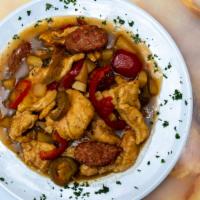 Chicken Scarpariello · Morsels of boneless chicken with Italian sausage, hot or sweet cherry peppers in a garlic wi...