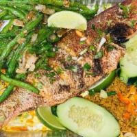 Grill Or Fried Snapper · Served with rice and mixed vegetable.