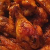 Buffalo Wings (10 Pieces) · Chicken wings breaded and fried.