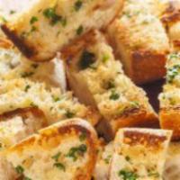 Garlic Bread · Bread, topped with garlic & olive oil or butter, herb
seasoning, baked to perfection. Melts ...