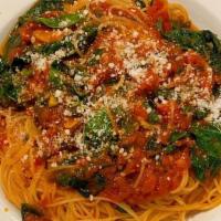 Pasta Spinaci · Fresh spinach, filetto di pomodoro sauce and garlic.