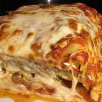 Meat Lasagna · Topped with mozzarella.