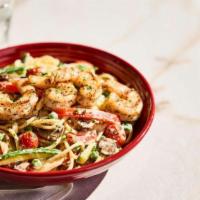 New! Spaghetti Primavera · Tossed with sautéed red bell peppers, zucchini, mushrooms, peas and roasted tomatoes, finish...
