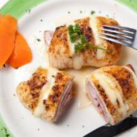 Chicken Cordon Bleu · Chicken stuffed with ham & swiss served with potato and vegetable.
