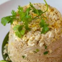 Crab Fried Rice · Thai style stir-fried rice, crab meat, onions, egg, and scallion.