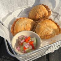 Chicken Curry Puff  · Mined chicken, potato, onions mixed curry powder serve with cucumber relish.