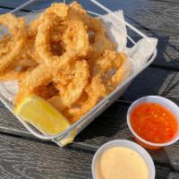 Calamari · Crispy fried calamari serve with sweet chili sauce and spicy mayo.