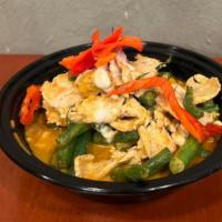 Panang Curry · Spicy. String bean, and bird eye chili in panang curry.