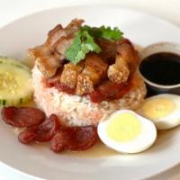 Kao Nar Moo Krob Moo Dang  · Homemade crispy pork& BBQ roast pork, boiled egg, sausage over jasmine rice with seasoning g...