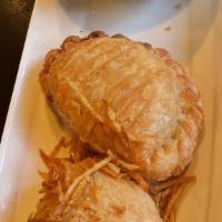 Curry Puff · Hot. Chicken, potato, onion, light yellow curry deep fried, stuffed in pastry puff.