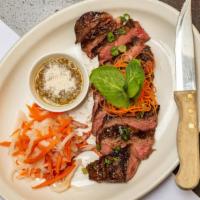 Erawan Steak · Broiled marinated sirloin, Thai chili dip. 

(Due to a meat supply shortage we had to tempor...