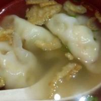 Gyoza Soup · Vegetarian broth with veggie dumpling.