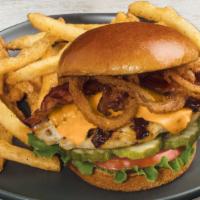 Friday'S™ Signature Whiskey-Glazed Chicken Sandwich · Grilled chicken, Signature Whiskey-Glaze, hickory-smoked bacon, white cheddar, Cajun-spiced ...