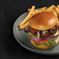 Fridays™ Signature Whiskey-Glazed Burger · Top menu item. Signature Whiskey-Glaze, white cheddar, lettuce, red onions, tomato, pickles,...