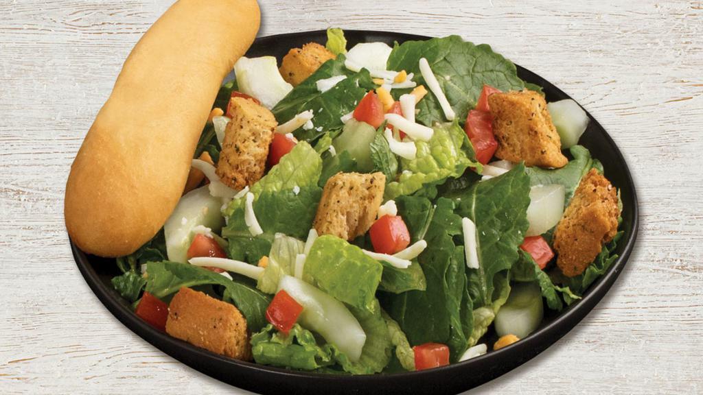 House Salad · Mixed greens, sliced carrots, red cabbage, tomatoes, cucumber, mixed cheese and Asiago croutons. Served with a warm garlic breadstick and choice of dressing on the side.