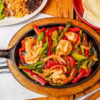 Shrimp Fajitas · Choice of tortilla with sauteed poblano peppers, bell peppers, onions and roasted tomato sau...