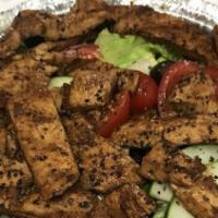 Balsamic Grilled Chicken Salad · Grilled chicken marinated in our signature balsamic and herb sauce atop romaine lettuce, tom...