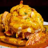 Cola Rellena De Camarones  · Lobster Tail Stuffed with Shrimp
