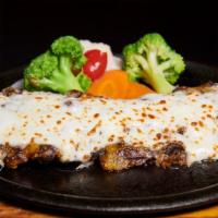 Churrasco Campesino · Skirt Steak Stuffed with Sweet Plantain Topped with Mozzarella Cheese