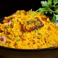 Arroz Con Arenque · Rice with Herring