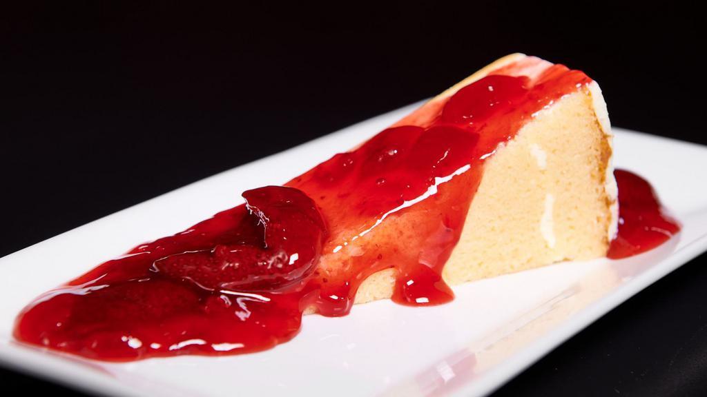 Quesillo Con Fresas · Cheesecake Topped with Strawberries