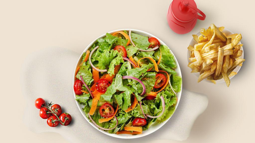 Toss Your Salad · Build a salad topped with your favorite choice of toppings!
