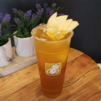 Passion Fruit Mountain Iced Tea · W/ apple, orange & lemon slices.