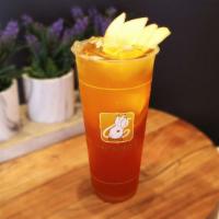 Pineapple Golden Oolong Iced Tea · W/ orange & lemon slices.