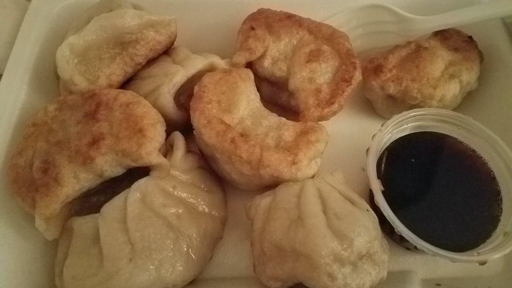 Steamed Pork Dumplings · Eight pieces.