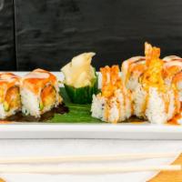 Muscle Beach · Tempura Shrimp, spicy tuna, and avocado topped with snow crab mix, chef sauce, and eel sauce.