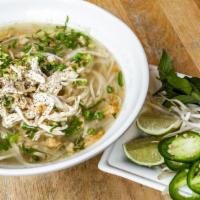 Pho I · Rice noodles in aromatic beef broth, with cilantro, scallion, onion, and lime. Served with b...
