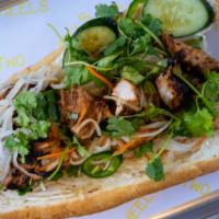 Banh Mi · Artisanal French baguette baked fresh daily with pickled daikon and carrot, mayo, cucumber, ...