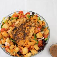 Alaskan River · Mixed greens, grilled salmon, roasted corn, carrots, cherry tomato, cucumbers, croutons, bal...