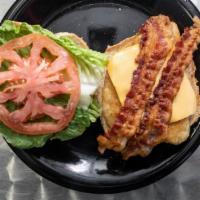 Buttermilk Chicken Sandwich · Buttermilk chicken, lettuce, tomato, bacon, and cheese with russian dressing