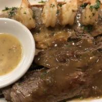 New York Sirloin Steak · with Onion Rings